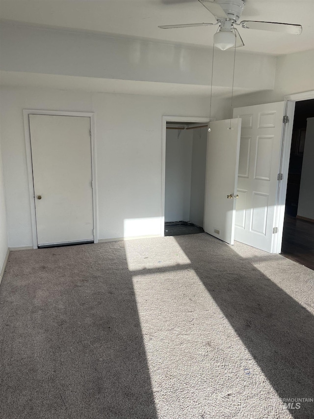 825 S 12th E, Mountain Home, ID 83647 - empty room featuring carpet floors and ceiling fan