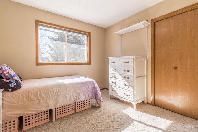 bedroom with light carpet