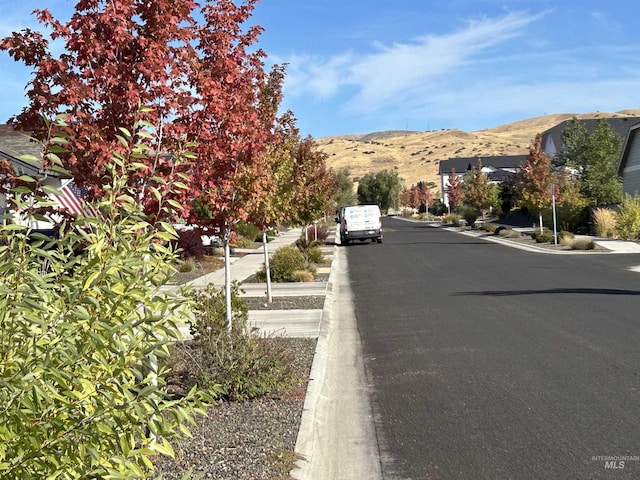 20447 N Glenisla, Boise, ID 83714 - view of street featuring sidewalks, a mountain view, and curbs