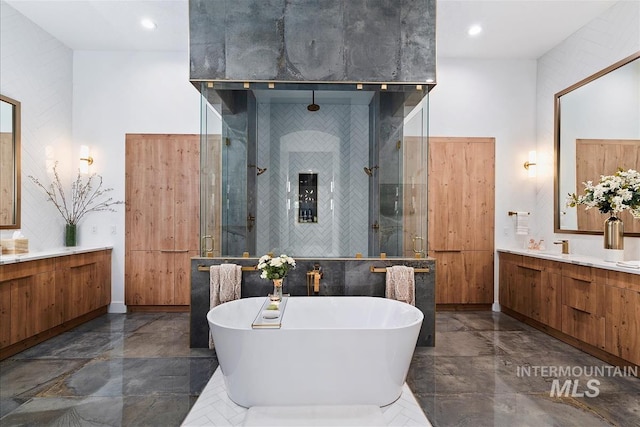 bathroom with a high ceiling, plus walk in shower, and vanity