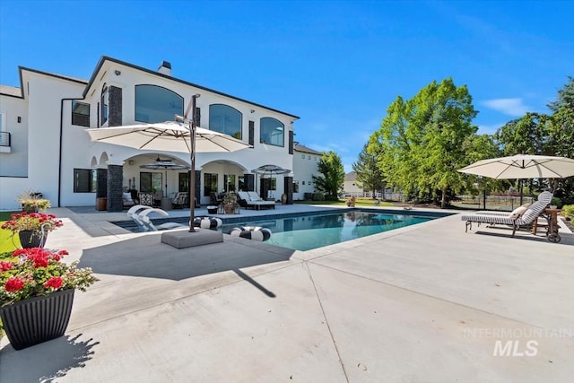 rear view of house with a patio