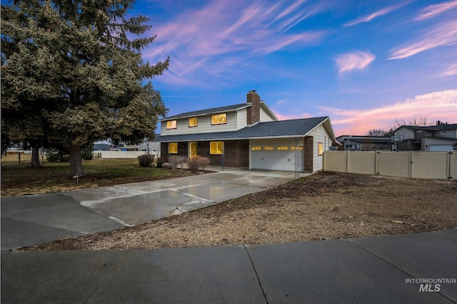 view of front of property featuring a garage