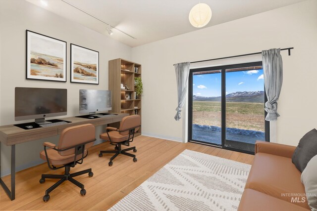 269 N 100 E, Fairfield, ID 83327 - office featuring wood finished floors, rail lighting, and baseboards