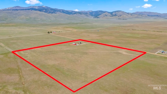 269 N 100 E, Fairfield, ID 83327 - aerial view of property and surrounding area with property parcel outlined and a mountain backdrop