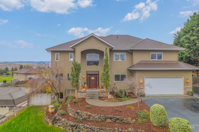 view of front of home with a garage