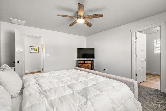 bedroom with carpet floors and ceiling fan