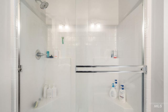 bathroom featuring an enclosed shower