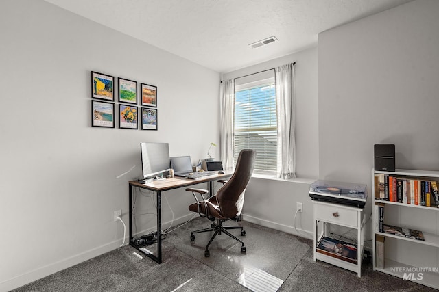 office space featuring a textured ceiling