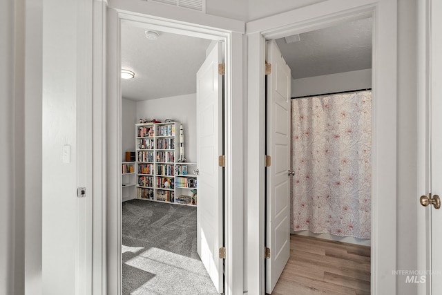 bathroom featuring a textured ceiling