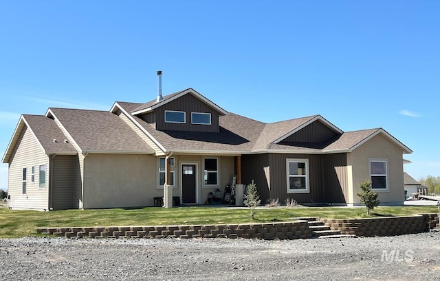 628 Pioneer Mountain Loop, Jerome, ID 83338 - view of front of property featuring a front lawn and board and batten siding