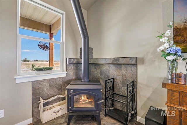 628 Pioneer Mountain Loop, Jerome, ID 83338 - detailed view of a wood stove and baseboards