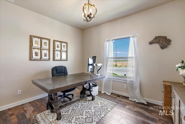 628 Pioneer Mountain Loop, Jerome, ID 83338 - office space featuring baseboards, a chandelier, and wood-type flooring