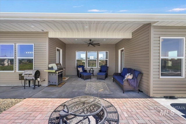628 Pioneer Mountain Loop, Jerome, ID 83338 - view of patio featuring a grill, ceiling fan, and an outdoor hangout area