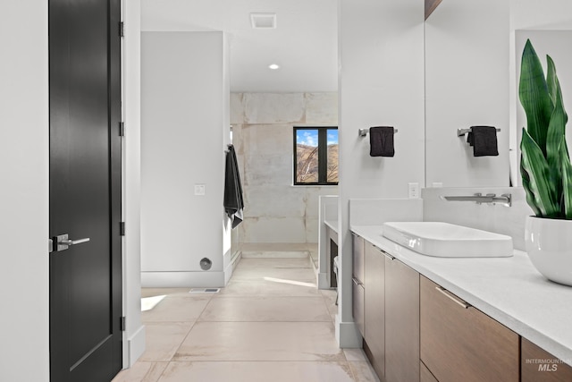 full bath with recessed lighting, visible vents, vanity, marble finish floor, and walk in shower