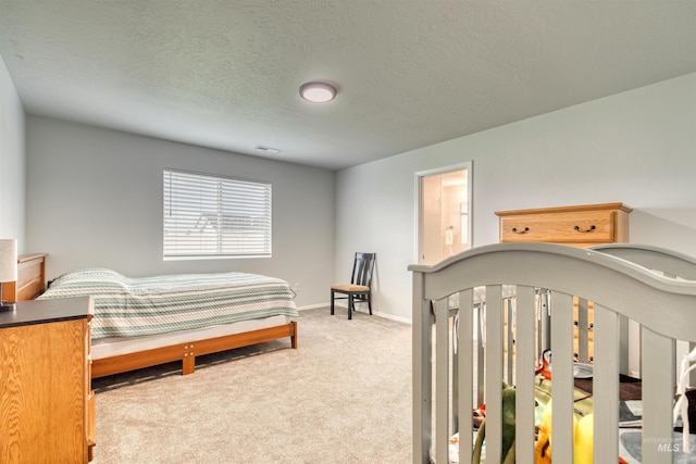 4913 Endicott Dr, Caldwell, ID 83605 - carpeted bedroom featuring a textured ceiling and baseboards