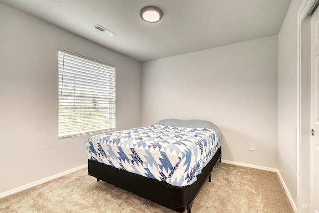 4913 Endicott Dr, Caldwell, ID 83605 - bedroom with carpet flooring and baseboards