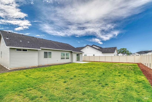 4913 Endicott Dr, Caldwell, ID 83605 - back of house with a patio and a shingled roof