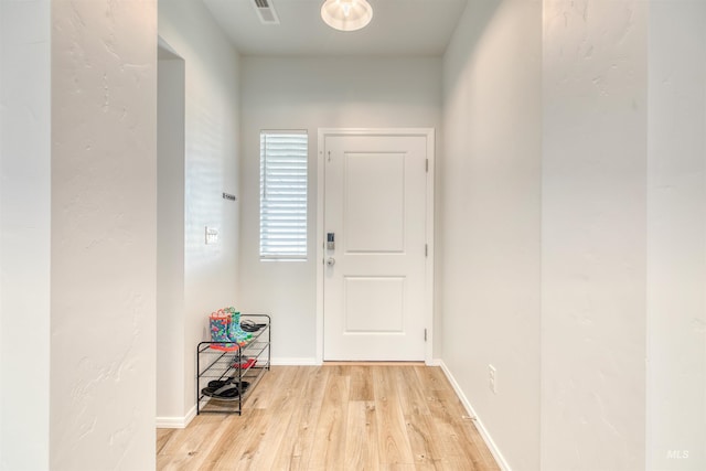 4913 Endicott Dr, Caldwell, ID 83605 - doorway to outside with wood finished floors and baseboards