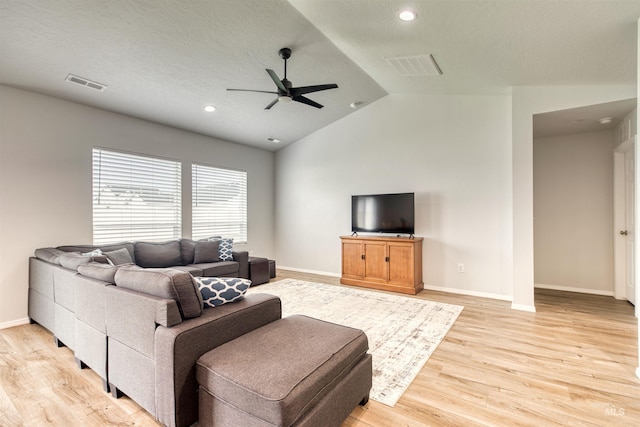 4913 Endicott Dr, Caldwell, ID 83605 - living area featuring ceiling fan, light wood-type flooring, vaulted ceiling, and recessed lighting
