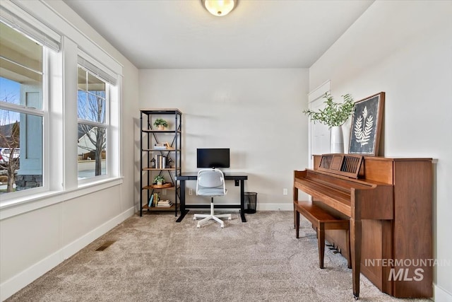 view of carpeted office space