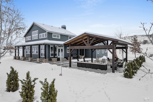 view of snow covered property