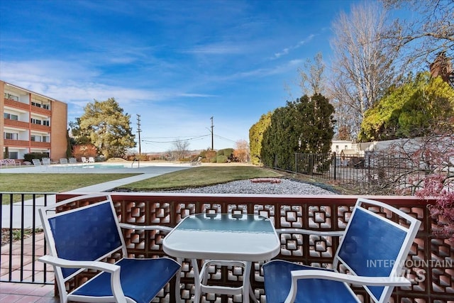 balcony featuring outdoor dining space