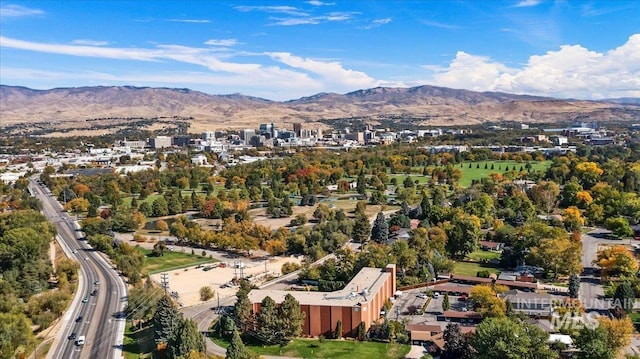 drone / aerial view featuring a mountain view