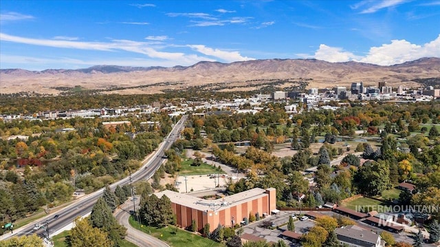 drone / aerial view featuring a mountain view