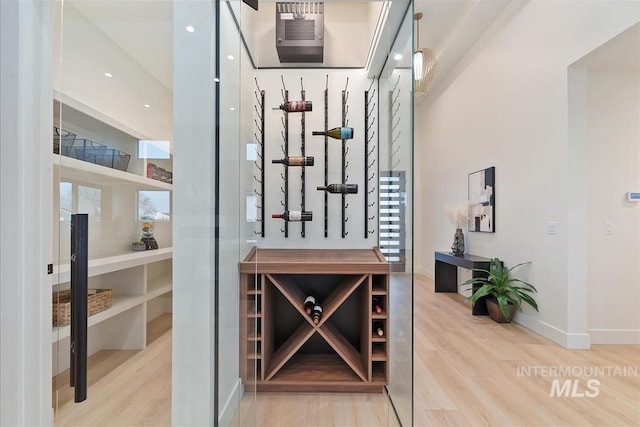 9891 W Napier Ct, Star, ID 83669 - wine room featuring wood finished floors and baseboards