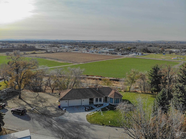 birds eye view of property featuring a rural view