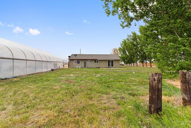 27410 Peckham Rd, Wilder, ID 83676 - view of yard featuring a greenhouse and an outbuilding