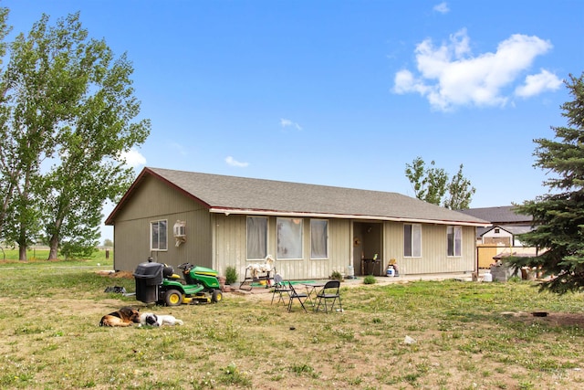 27410 Peckham Rd, Wilder, ID 83676 - back of house featuring a yard