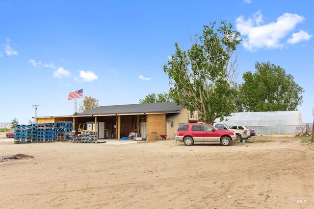27410 Peckham Rd, Wilder, ID 83676 - exterior space featuring a greenhouse and uncovered parking