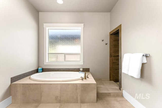 3061 S Fox Run Ave, Eagle, ID 83616 - bathroom with a garden tub, tiled shower, and tile patterned flooring
