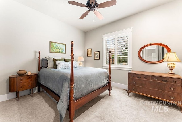 3061 S Fox Run Ave, Eagle, ID 83616 - bedroom with light colored carpet, baseboards, and ceiling fan