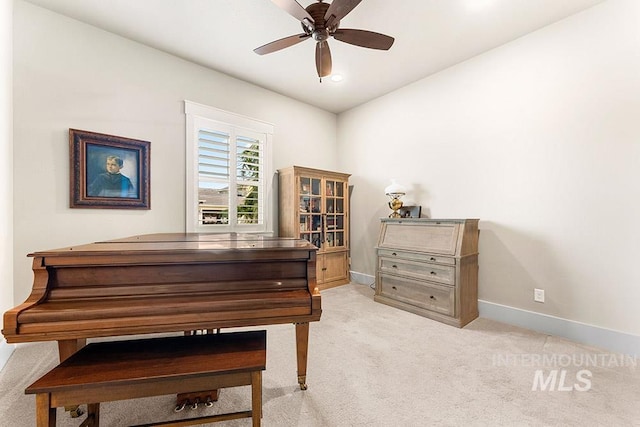 3061 S Fox Run Ave, Eagle, ID 83616 - sitting room with baseboards, a ceiling fan, and light carpet