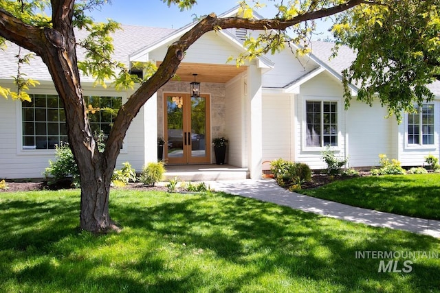2801 E Red Tail Ct, Eagle, ID 83616 - entrance to property with french doors and a lawn