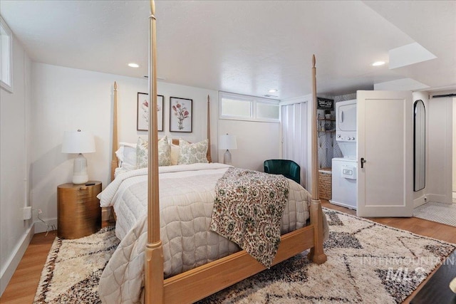 bedroom with light hardwood / wood-style flooring