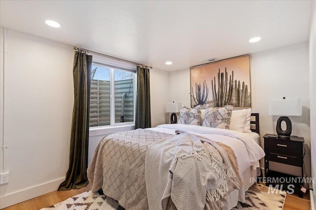 bedroom featuring light wood-type flooring