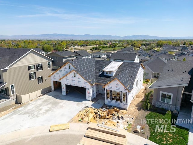 bird's eye view featuring a mountain view and a residential view