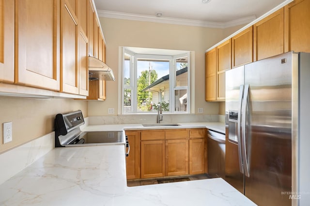 2072 N 28th St, Boise, ID 83702 - kitchen featuring appliances with stainless steel finishes, a sink, under cabinet range hood, ornamental molding, and light stone countertops