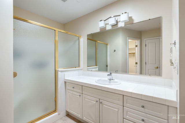 2072 N 28th St, Boise, ID 83702 - full bath featuring a stall shower, vanity, and a walk in closet