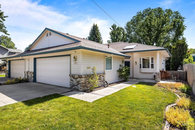 2072 N 28th St, Boise, ID 83702 - ranch-style home with a garage, concrete driveway, roof with shingles, and solar panels