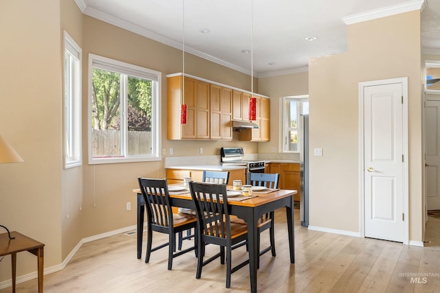 2072 N 28th St, Boise, ID 83702 - dining space featuring light wood finished floors, baseboards, ornamental molding, and recessed lighting