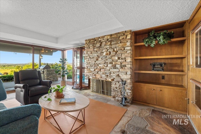 2401 Terrace Dr, Caldwell, ID 83605 - living room with a textured ceiling and a fireplace