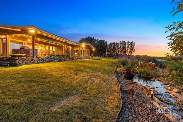 2401 Terrace Dr, Caldwell, ID 83605 - yard at dusk featuring a yard