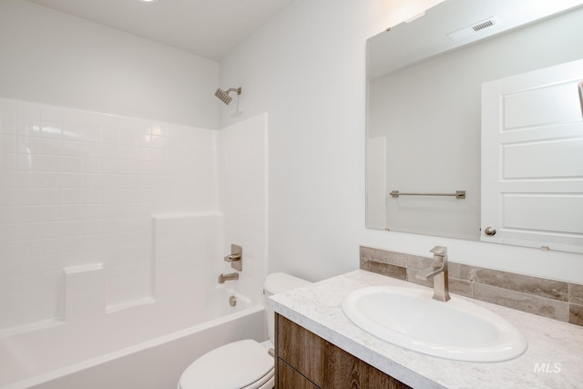 full bath with shower / bath combination, vanity, toilet, and visible vents
