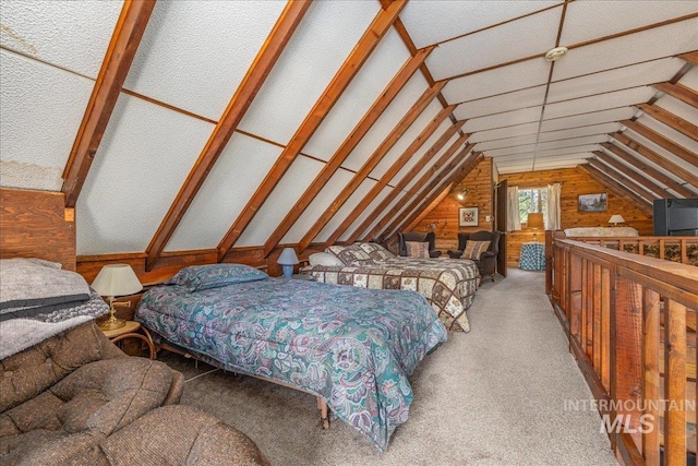 carpeted bedroom featuring lofted ceiling and wood walls