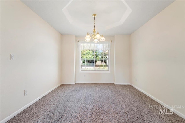 3314 S Raintree, Nampa, ID 83669 - carpeted spare room with a chandelier and a tray ceiling