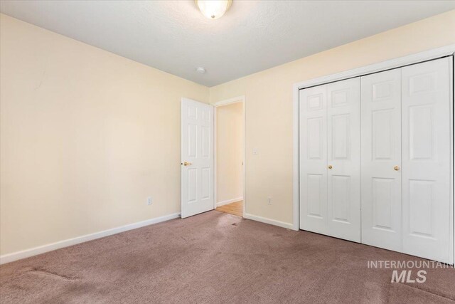 3314 S Raintree, Nampa, ID 83669 - unfurnished bedroom featuring carpet floors and a closet